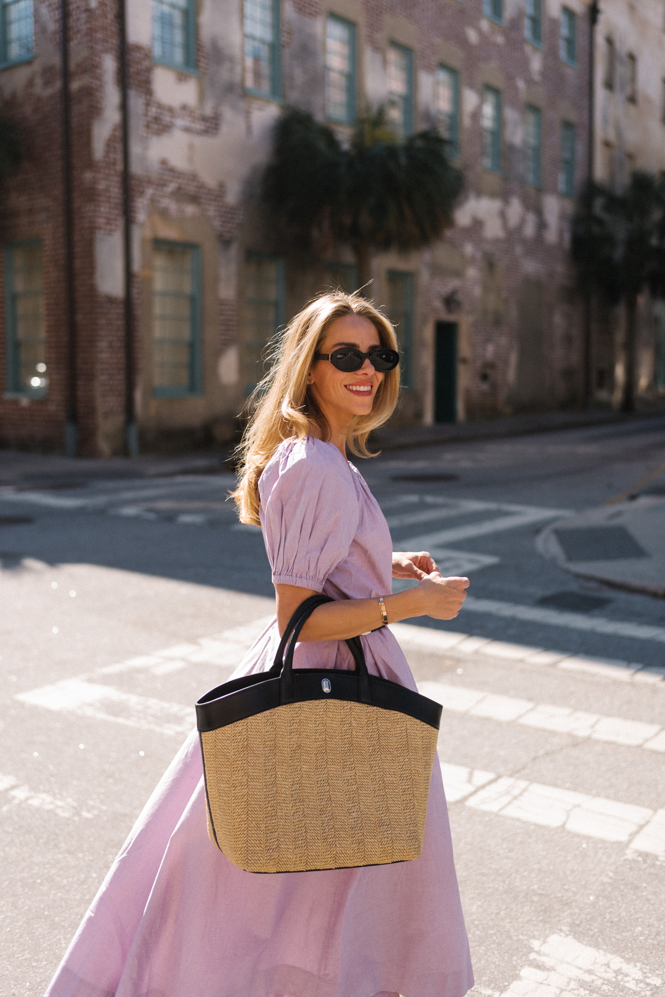 lavender midi dress rattan tote silver pumps