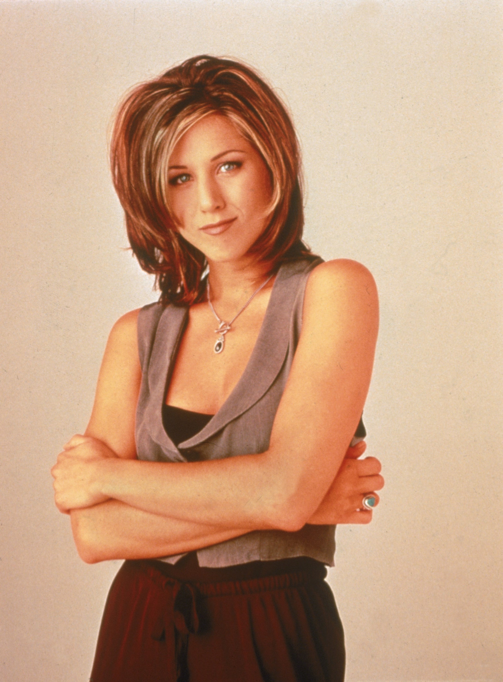 Image may contain Jennifer Aniston Blouse Clothing Face Head Person Photography Portrait Accessories and Jewelry