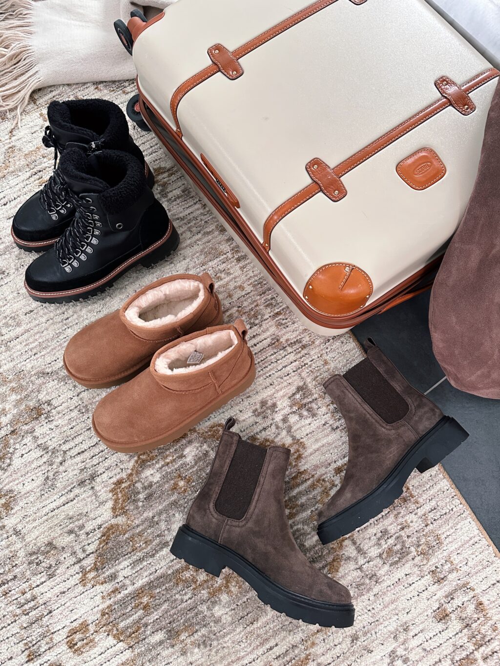 the cliffs maine winter boots & suitcase travel staples