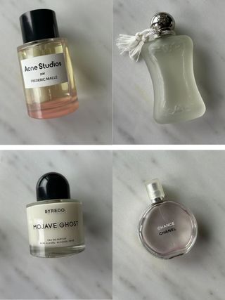 A picture of lightweight perfumes on a marble table