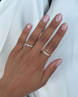 A pink pearlescent manicure