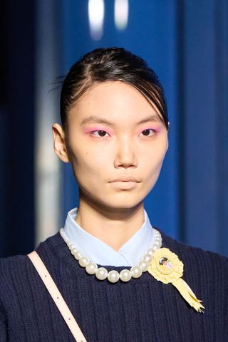 A model at Sandy Liang wearing a no mascara, a key Fashion Week Autumn/Winter 25 beauty look