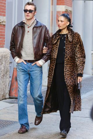 Nara Smith wearing a leopard-print coat with Lucky Blue Smith in NYC