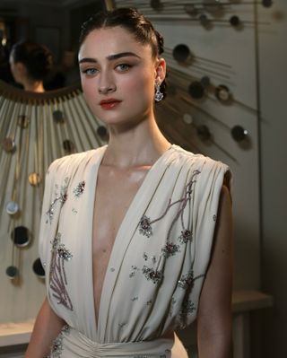 An image of Raffey Cassidy at the 2025 BAFTAs showing the brow pencil makeup trend.