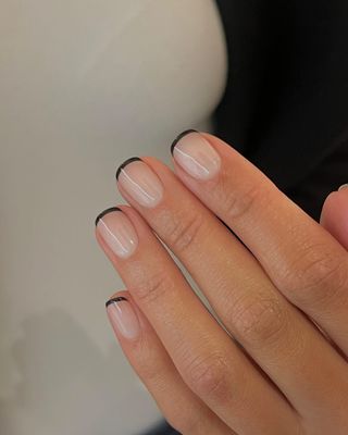 Short squoval nails with black French tips