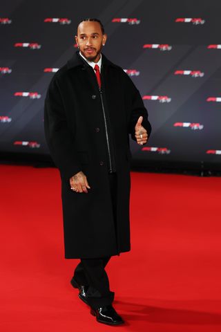 LONDON, ENGLAND - FEBRUARY 18: Lewis Hamilton of Great Britain and Scuderia Ferrari poses for a photo as he attends F1 75 Live at The O2 Arena on February 18, 2025 in London, England.