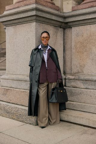 Photo of Scandi woman in winter street style during Copenhagen Fashion Week Fall-Winter 2025.