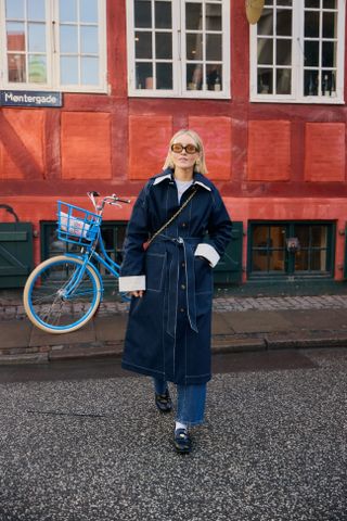 Photo of Scandi woman in winter street style during Copenhagen Fashion Week Fall-Winter 2025.