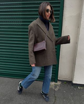 @lucyalston_ wearing straight leg jeans, wool blazer and sambas