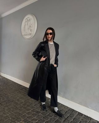 @annabelrosendahl wearing cashmere jumper with leather jacket and jeans