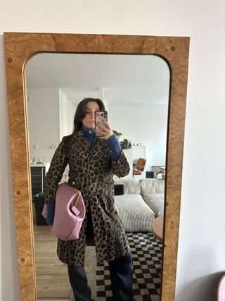 Fashion editor wearing big Coach bag