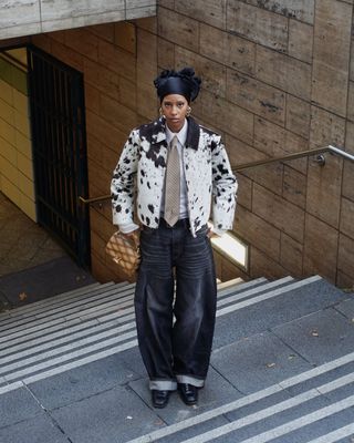 fashion influencer Hodan Yousug wearing barrel jeans with a cropped jacket