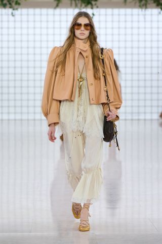 Spring Trouser Trends 2025: A model wears a pair of bloomer trousers on the Chloé runway