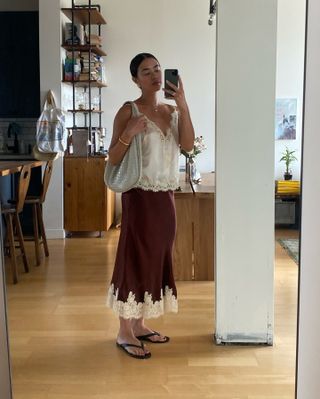 Influencer wearing a brown skirt