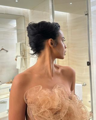 An image of influencer Rochelle Hume showcasing an updo for shoulder-length hair.