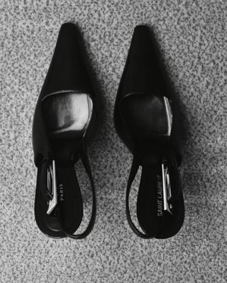 A pair of patent Saint Laurent slingback shoes