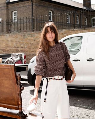 Fashion influencer @lauravidrequin at a vintage market in London wearing a chic spring outfit for 2025.