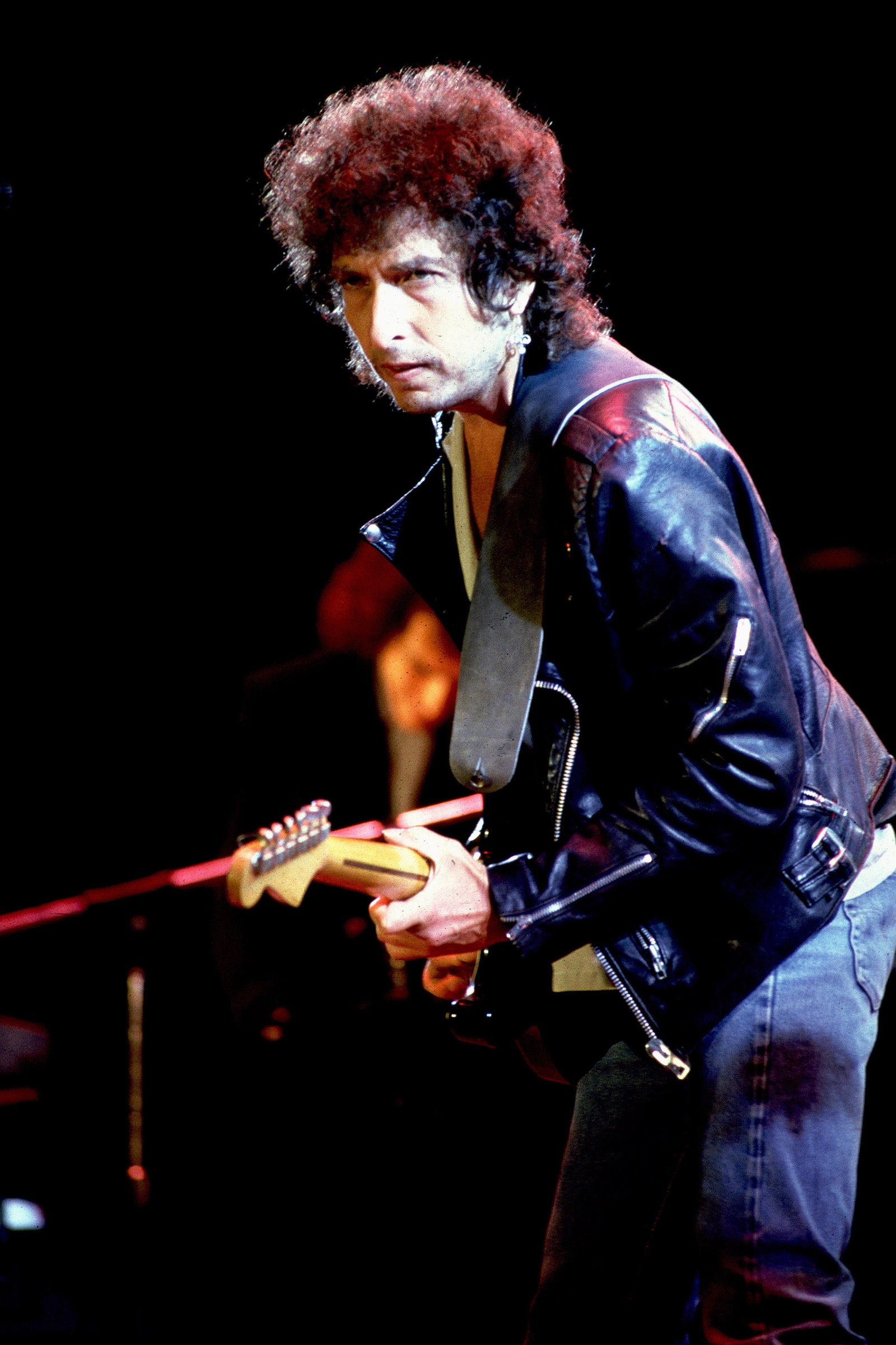 Image may contain Bob Dylan Concert Crowd Person Adult Clothing Coat Jacket Guitar and Musical Instrument