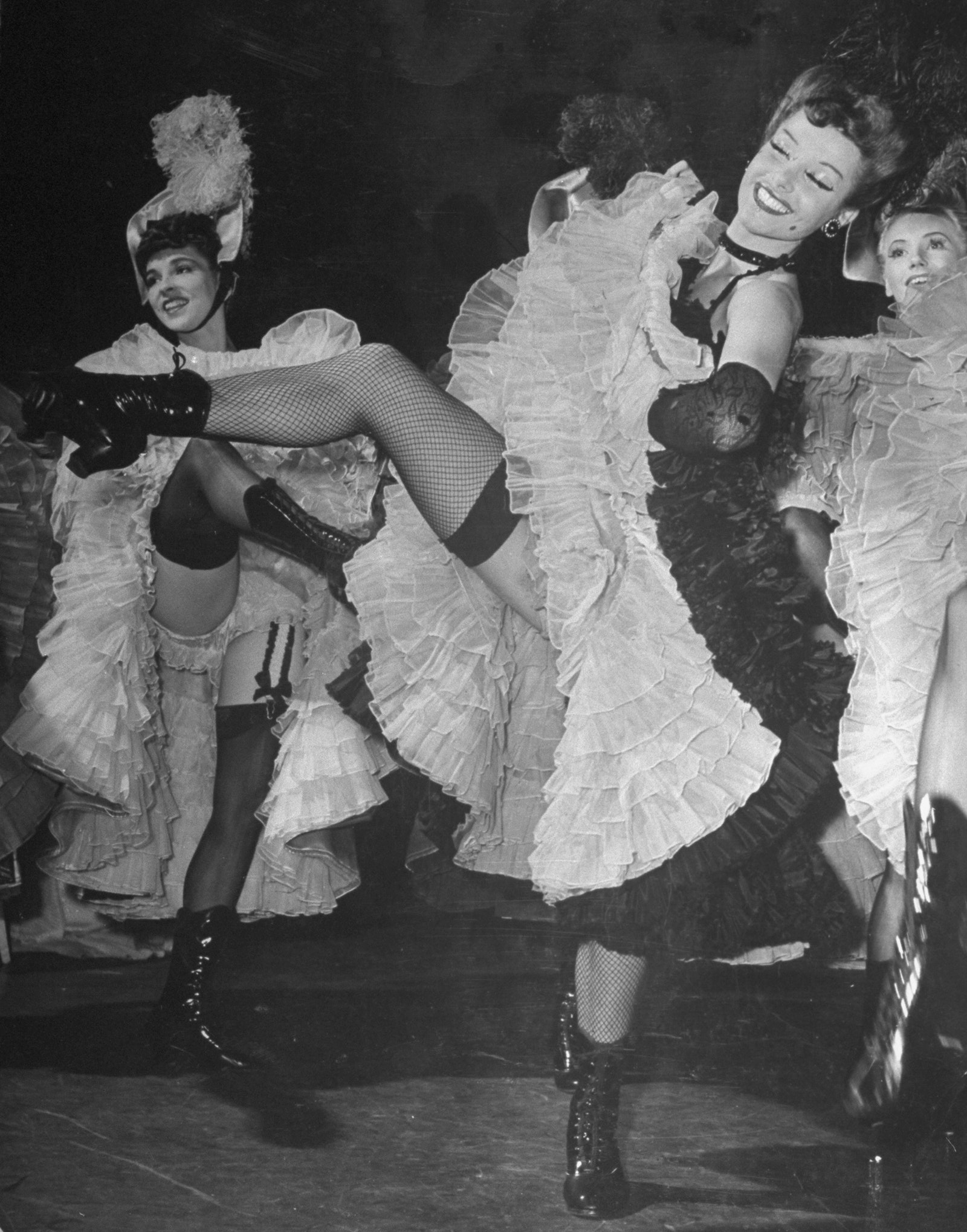 Girls performing the Can Can during the New Opera Company's Broadway production of Merry Widow.