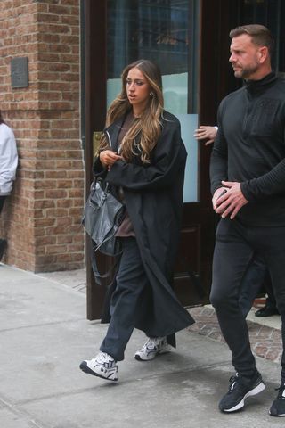 Tate McRae carrying a Balenciaga City Bag in New York