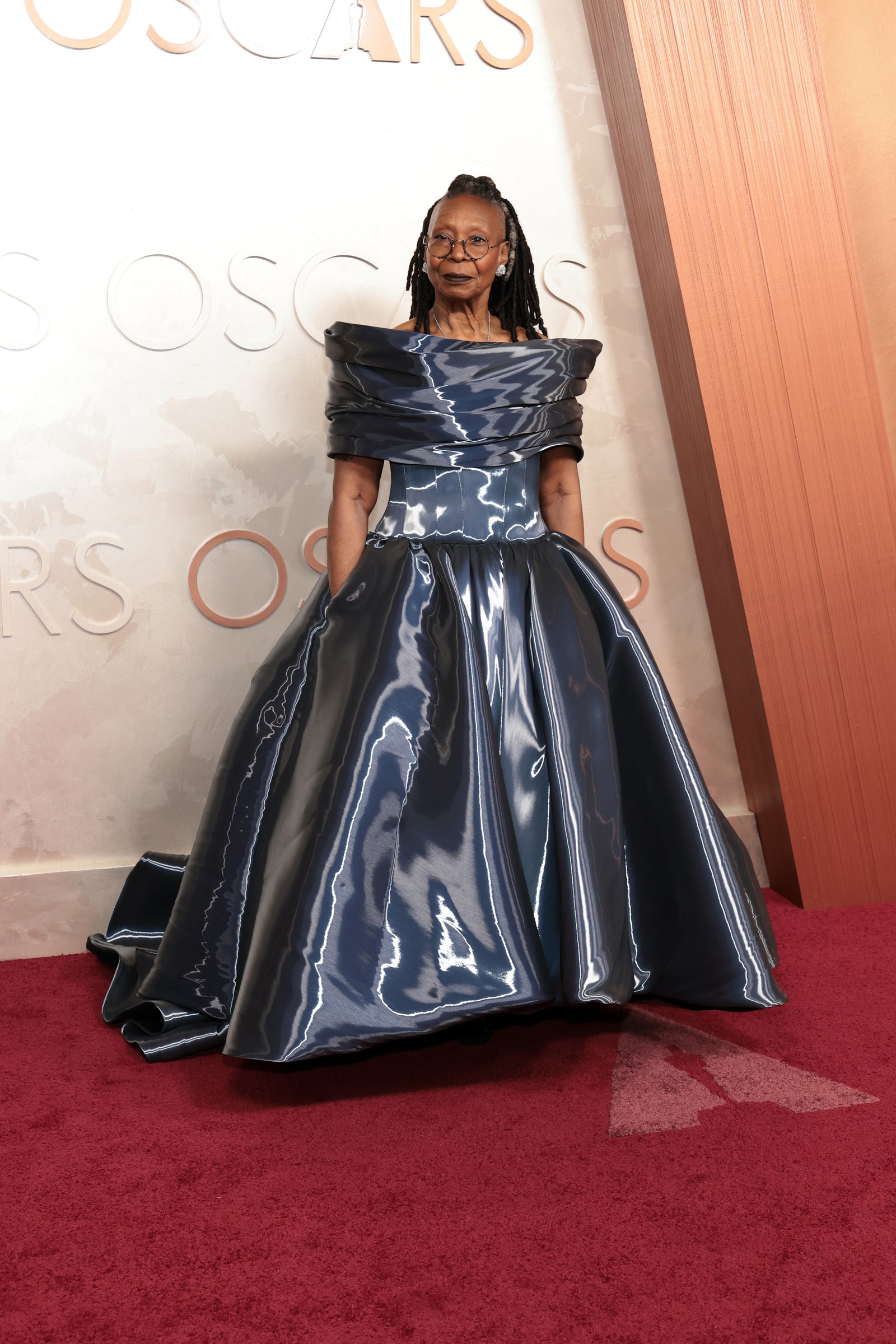 Image may contain Whoopi Goldberg Fashion Clothing Dress Formal Wear Gown Person Adult Accessories and Glasses