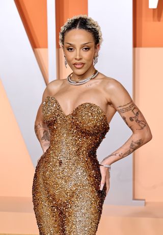 Doja Cat wears a torque necklace to the Oscars 2025