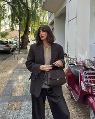 @juliesfi wearing brown blazer, jumper and silk trousers