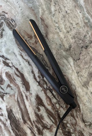 GHD Original hair straightener on marble surface