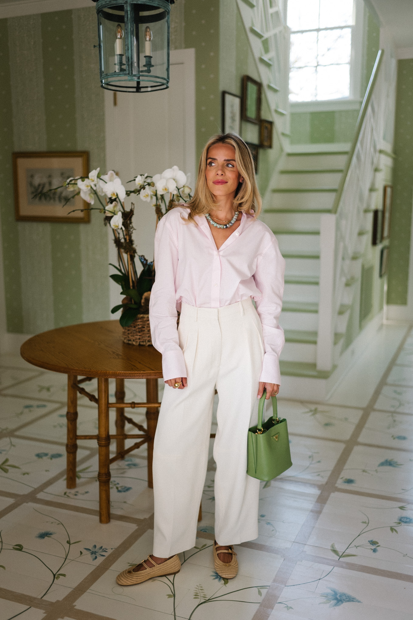 lavender poplin button up shirt white crepe tapered pants green handbag