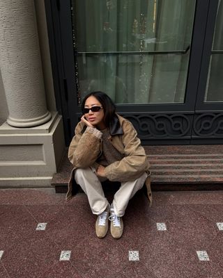 Aimee Song wearing a pair Miu Miu sneakers that tap into the '70s sneaker trend