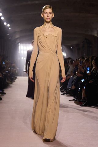 Model walking Victoria Beckham runway during Paris Fashion Week.