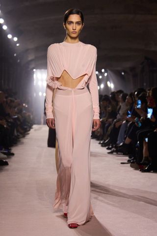 Model walking Victoria Beckham runway during Paris Fashion Week.