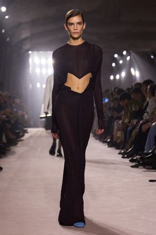 Model walking Victoria Beckham runway during Paris Fashion Week.