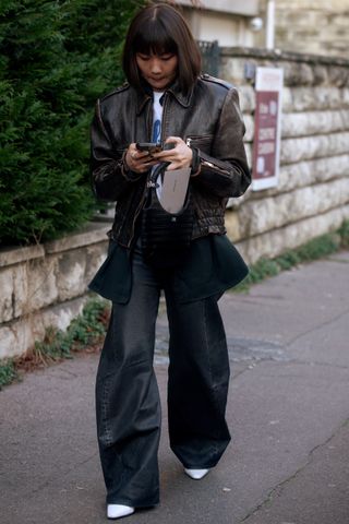 Woman wearing street style at Paris Fashion Week.