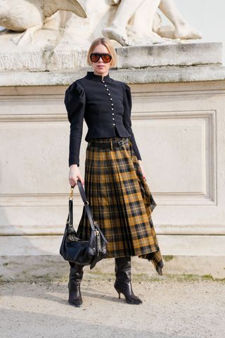 Woman wearing street style at Paris Fashion Week.