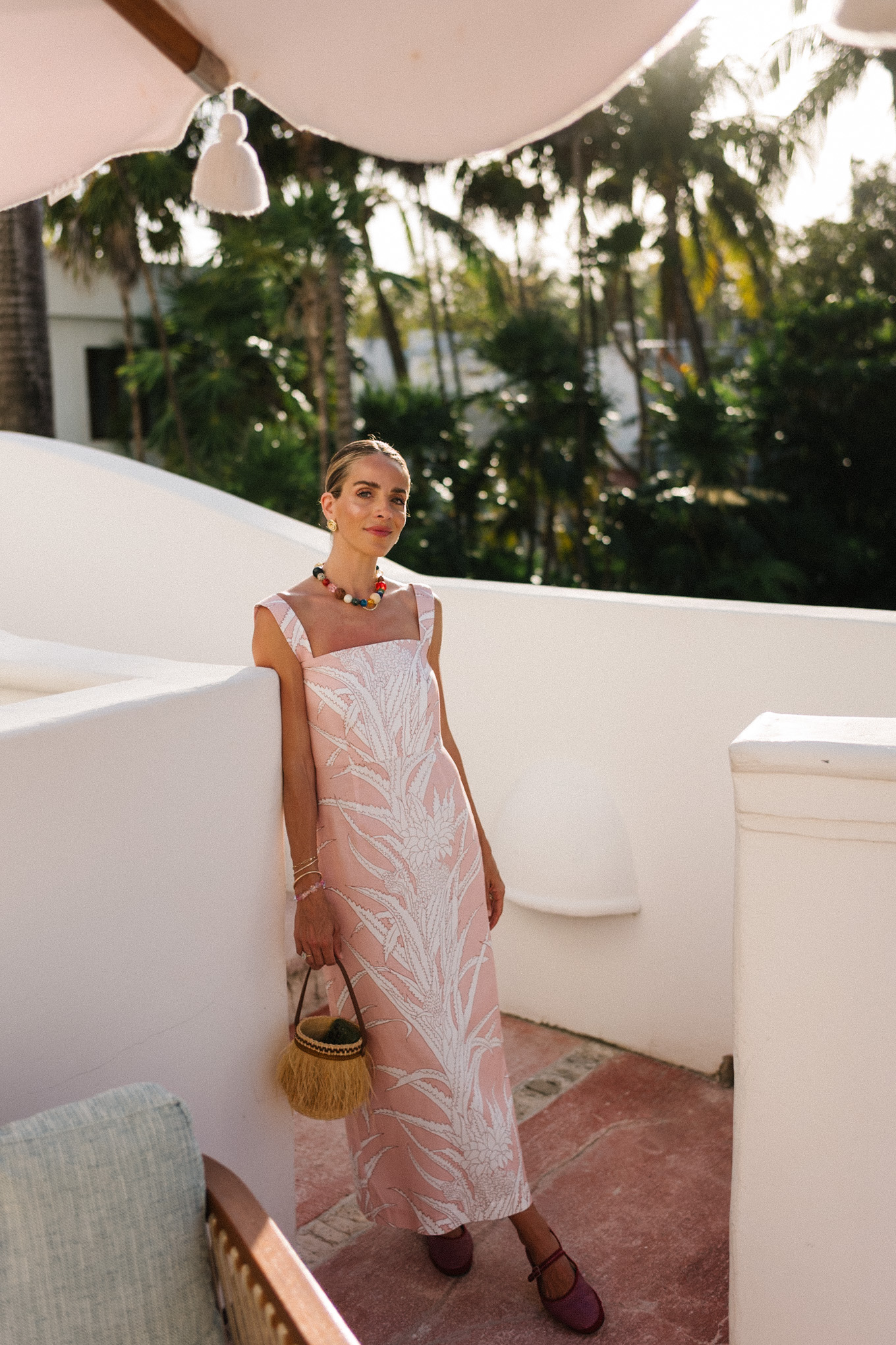 pastel pink cotton midi dress stone necklace pink raffia mary janes