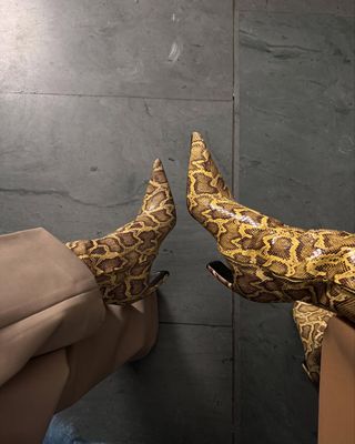 Influencer wearing snakeskin shoes