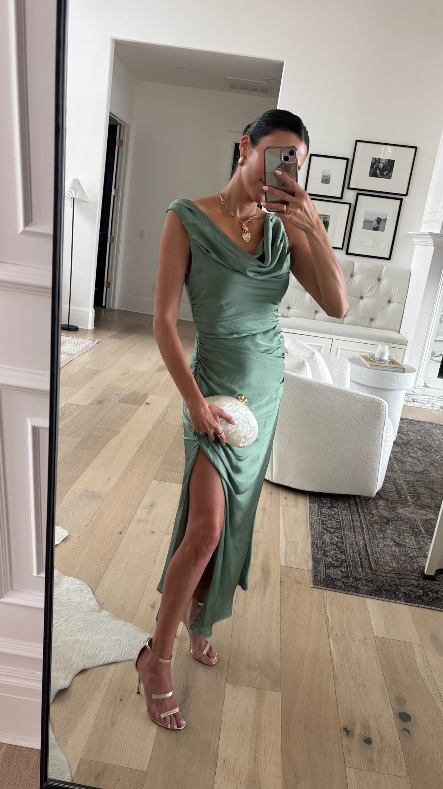 Christine Andrew in a green wedding guest dress from Abercrombie on sale