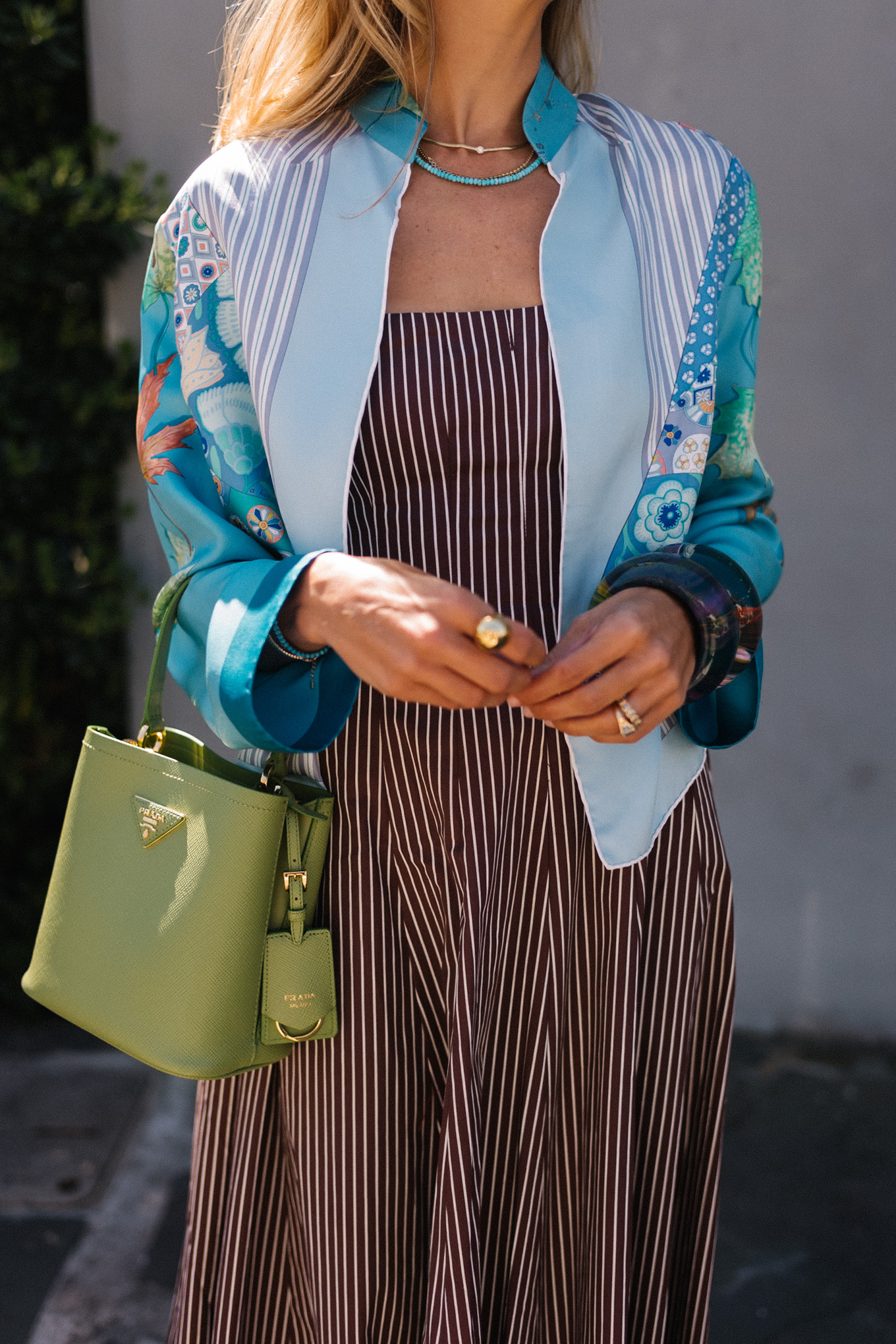 brown striped midi dress blue silk jacket green handbag woven flats