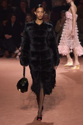 a Fendi model walks the fall/winter 2025 runway