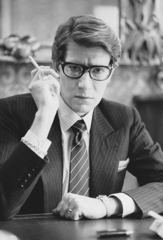 Photo of designer Yves Saint Laurent in Black and White.