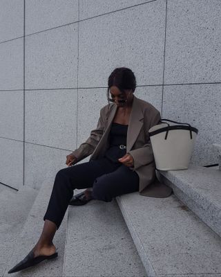 An image of influencer @aidabadji_ wearing slip-on loafers